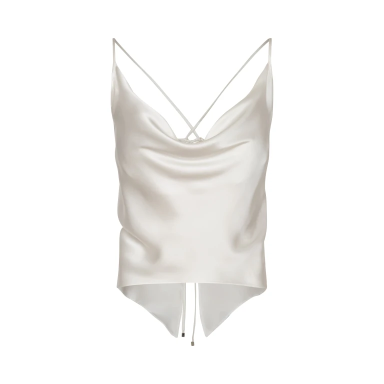 Andres Otalora luxury designer Top with bold silhouette in linen