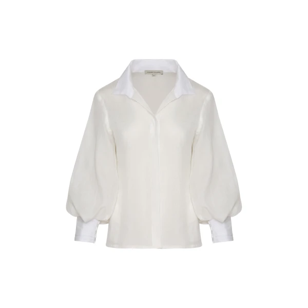 Andres Otalora luxury designer Top with bold silhouette in linen