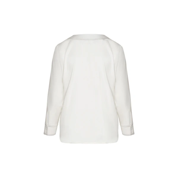 Andres Otalora luxury designer Top with bold silhouette in linen