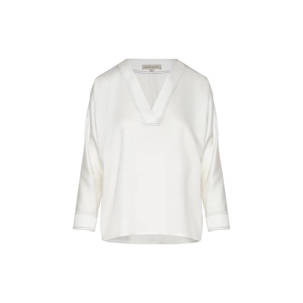 Andres Otalora luxury designer Top with bold silhouette in linen