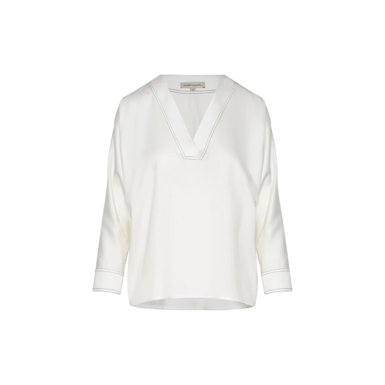 Andres Otalora luxury designer Top with bold silhouette in linen