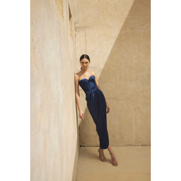 Andres Otalora luxury designer Top with bold silhouette in linen