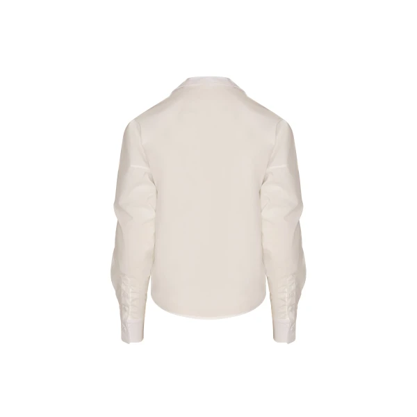 Andres Otalora luxury designer Top with bold silhouette in linen