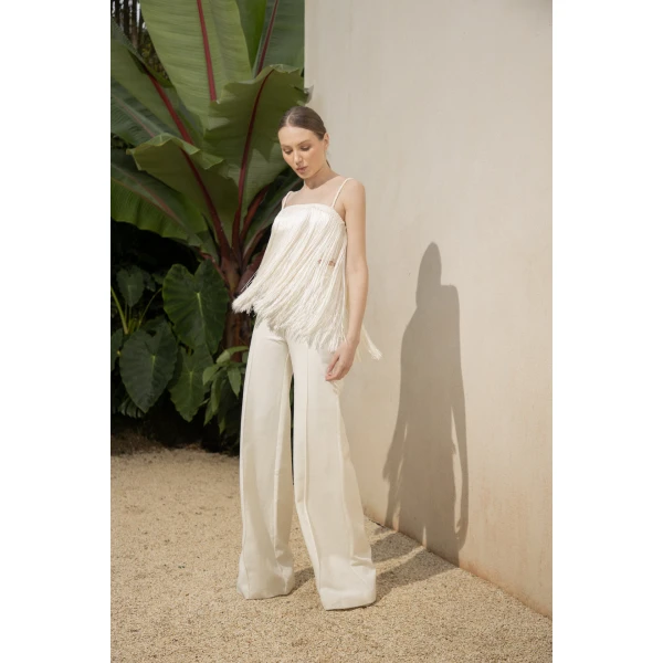 Andres Otalora luxury designer Top with bold silhouette in linen
