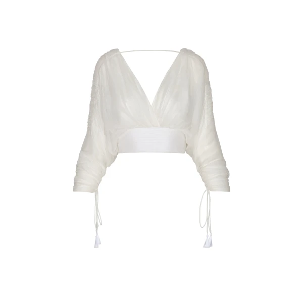 Andres Otalora luxury designer Top with bold silhouette in linen