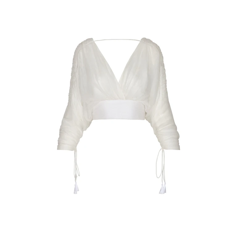 Andres Otalora luxury designer Top with bold silhouette in linen