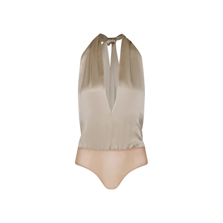 Andres Otalora luxury designer Swimsuit with bold silhouette in linen