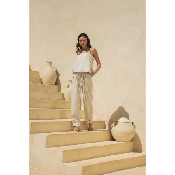 Andres Otalora luxury designer Top with bold silhouette in linen