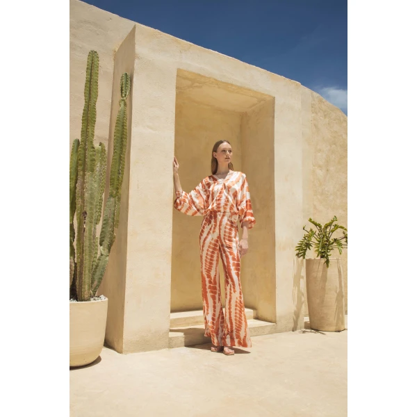 Andres Otalora luxury designer Top with bold silhouette in linen
