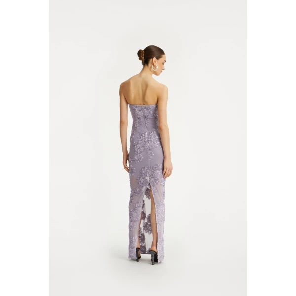 Rotate Purple from  Luxury Handbags – bold silhouette in vibrant color