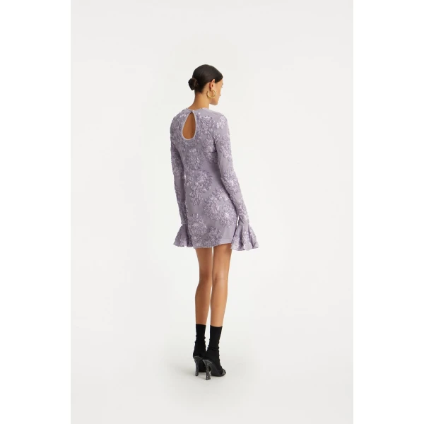 Rotate Purple from  Luxury Handbags – bold silhouette in vibrant color