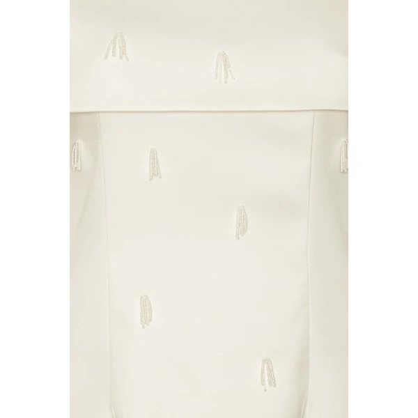 Rotate White from  Luxury Handbags – bold silhouette in vibrant color