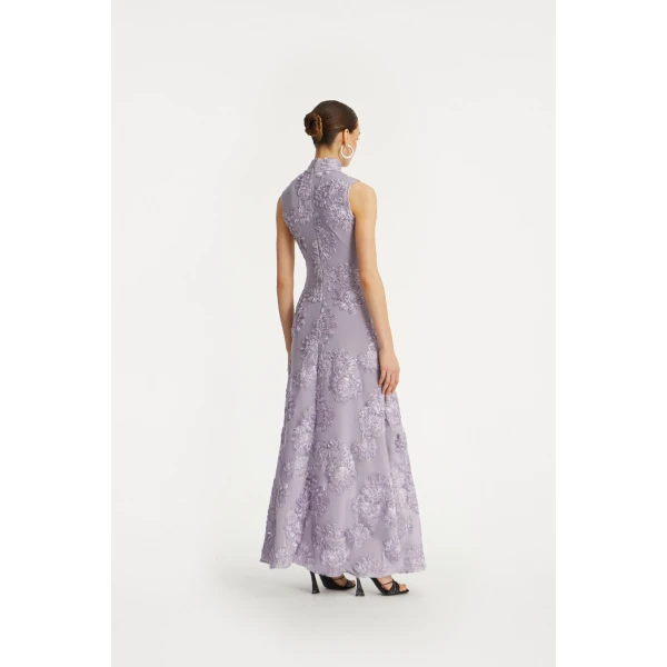 Rotate Purple from  Luxury Handbags – bold silhouette in vibrant color