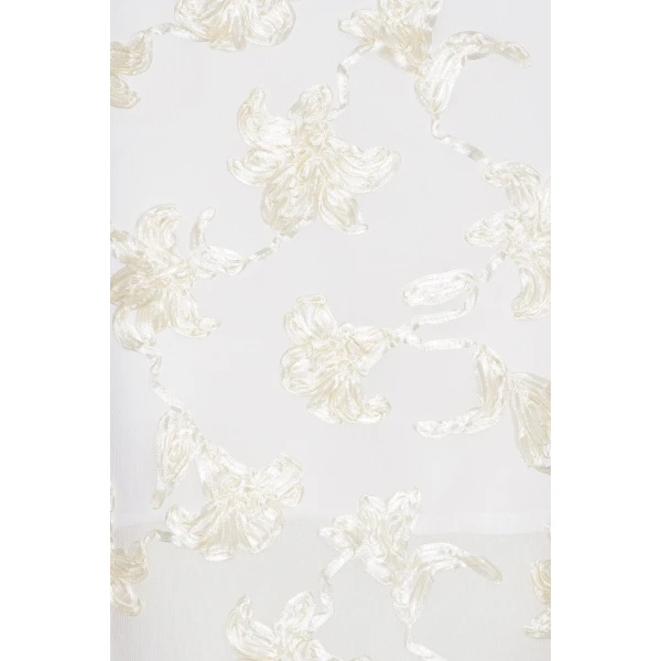 Rotate White from  Luxury Handbags – bold silhouette in vibrant color