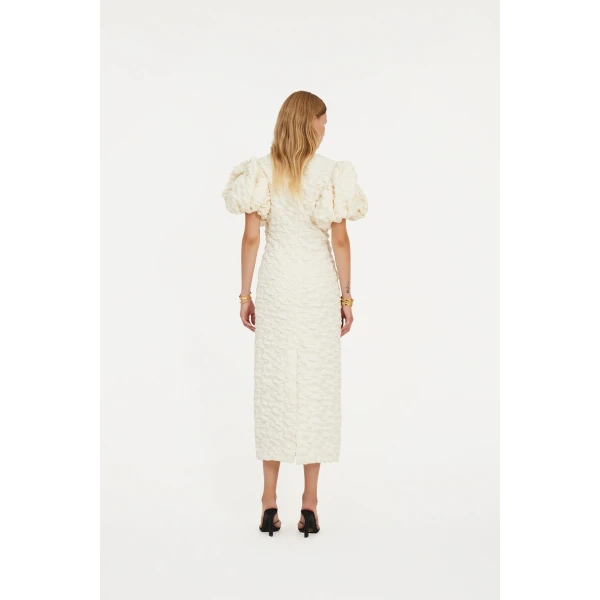Rotate White from  Luxury Handbags – bold silhouette in vibrant color