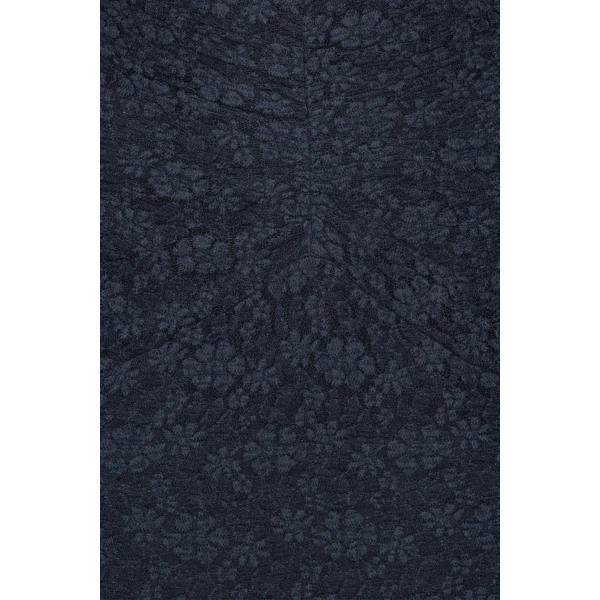 Rotate Blue from  Luxury Handbags – bold silhouette in vibrant color
