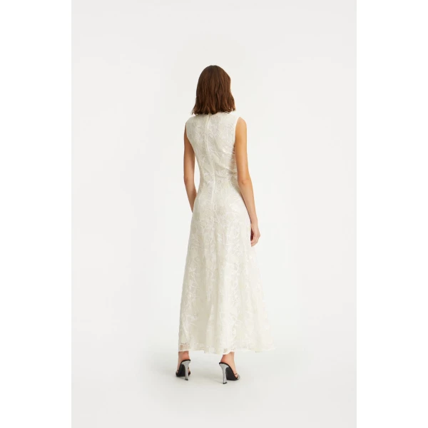 Rotate White from  Luxury Handbags – bold silhouette in vibrant color