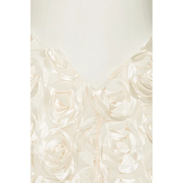 Rotate White from  Luxury Handbags – bold silhouette in vibrant color