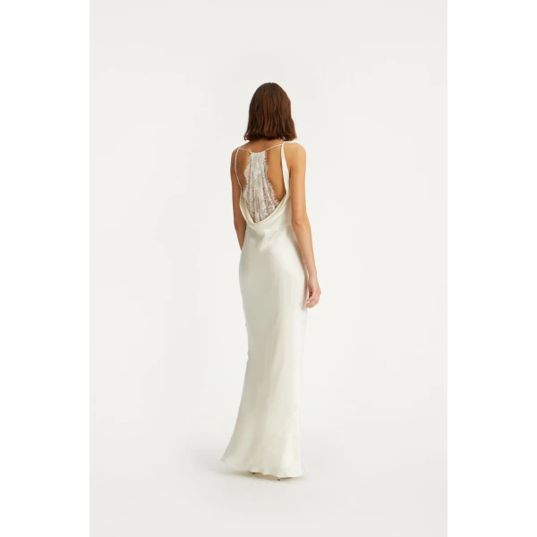 Rotate White from  Luxury Handbags – bold silhouette in vibrant color