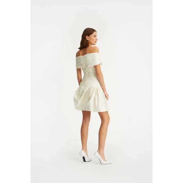 Rotate White from  Luxury Handbags – bold silhouette in vibrant color