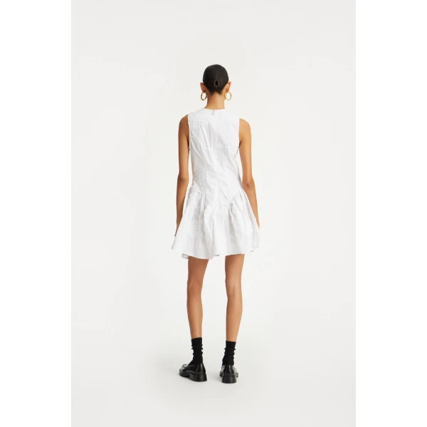 Rotate White from  Luxury Handbags – bold silhouette in vibrant color