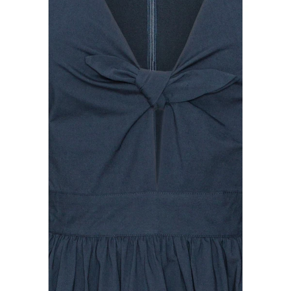 Rotate Blue from  Luxury Handbags – bold silhouette in vibrant color