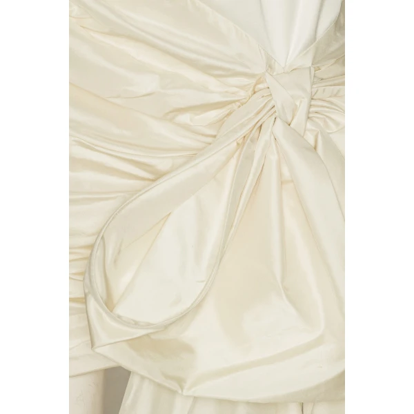 Rotate White from  Luxury Handbags – bold silhouette in vibrant color