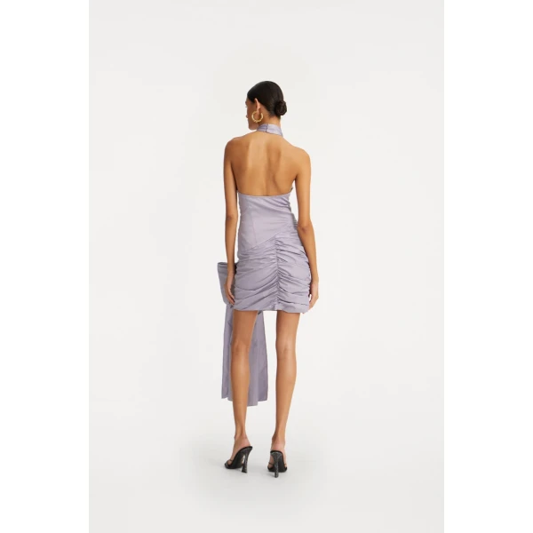Rotate Purple from  Luxury Handbags – bold silhouette in vibrant color
