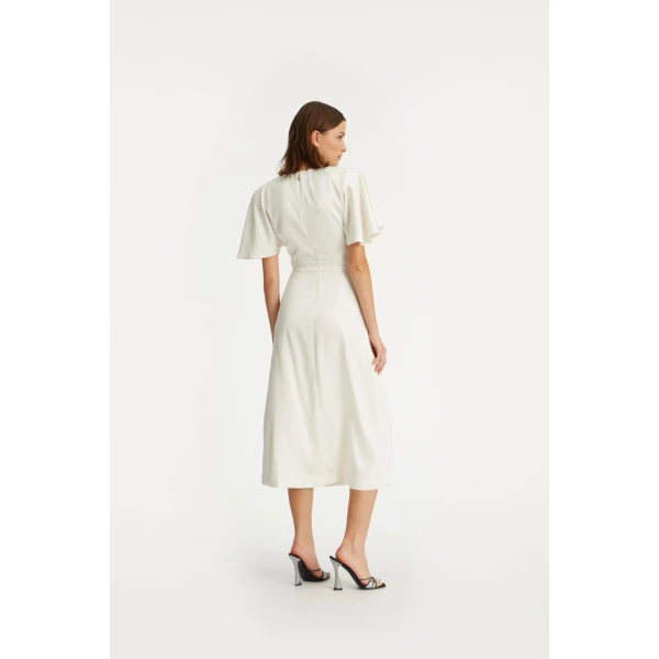 Rotate White from  Luxury Handbags – bold silhouette in vibrant color