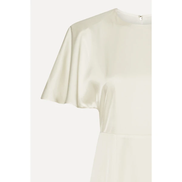 Rotate White from  Luxury Handbags – bold silhouette in vibrant color