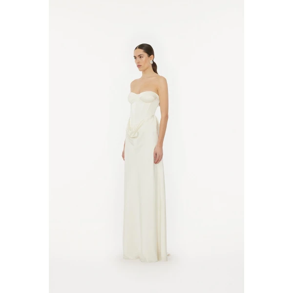Rotate White from  Luxury Handbags – bold silhouette in vibrant color