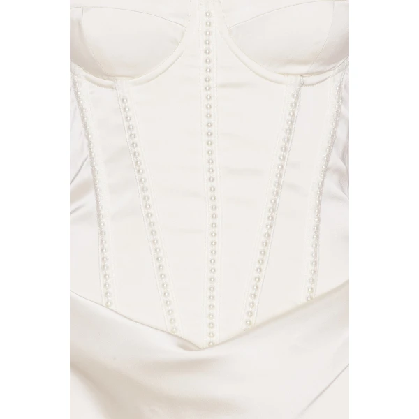Rotate White from  Luxury Handbags – bold silhouette in vibrant color