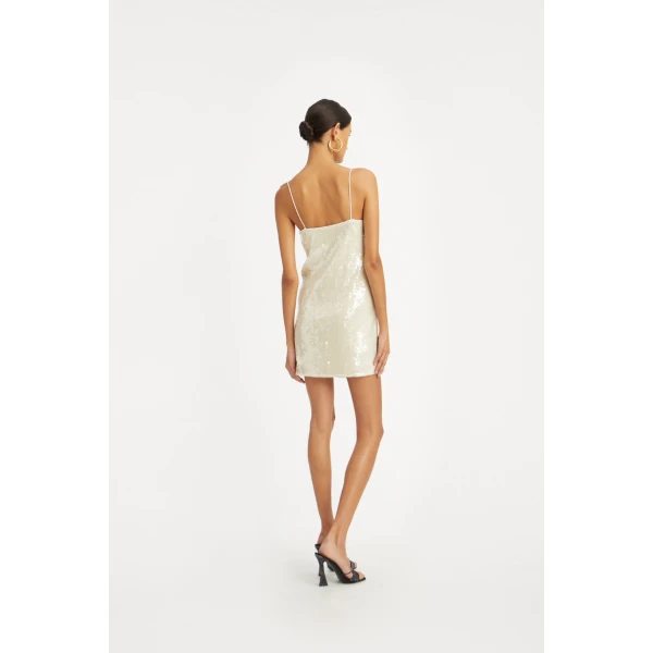 Rotate White from  Luxury Handbags – bold silhouette in vibrant color