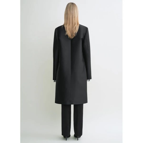 Toteme Coats with minimalist design at Luxury Shoes 