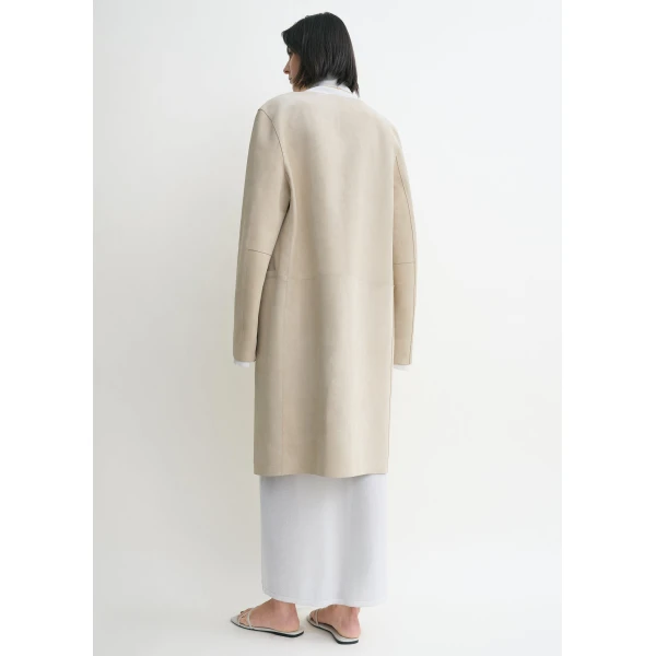 Toteme Coats with minimalist design at Luxury Shoes 