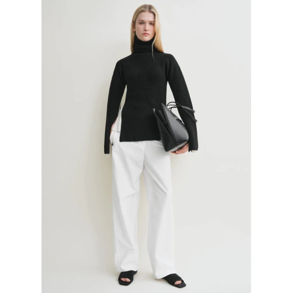 Toteme Knitwear with minimalist design at Luxury Shoes 
