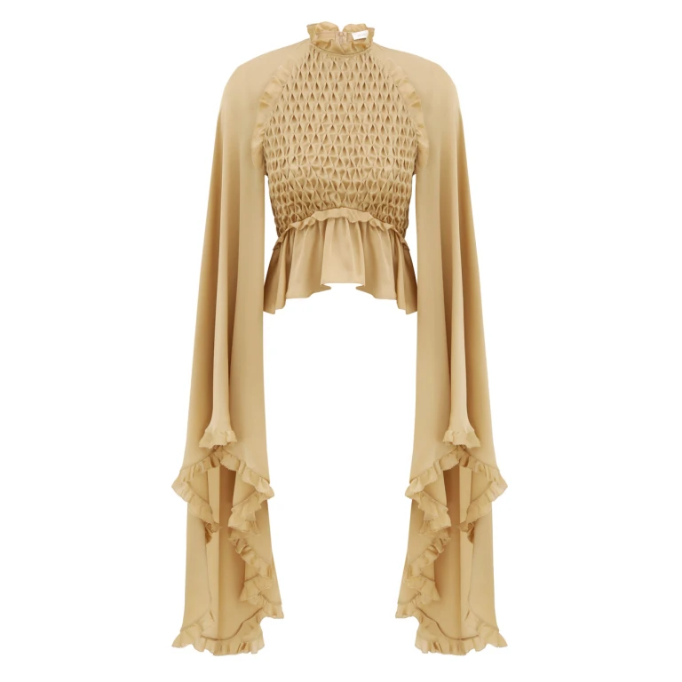 Elevate your elegance in this Zimmermann Tops   from the 2025 resort wear edit