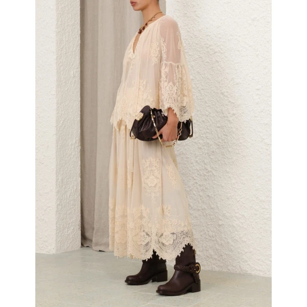 Elevate your elegance in this Zimmermann Tops   from the 2025 resort wear edit