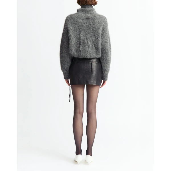 including a tasselled side zip