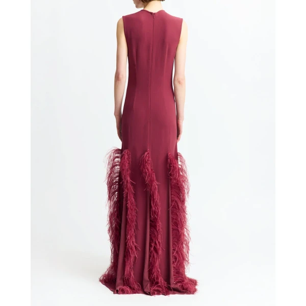 It features a jewel neckline and short sleeves