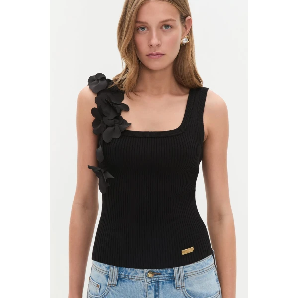 Aje Aus Tops – structured silhouette with raw femininity from Luxury Shoes 