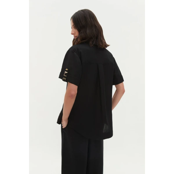 Aje Aus Tops – structured silhouette with raw femininity from Luxury Shoes 