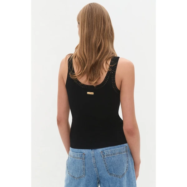 Aje Aus Tops – structured silhouette with raw femininity from Luxury Shoes 