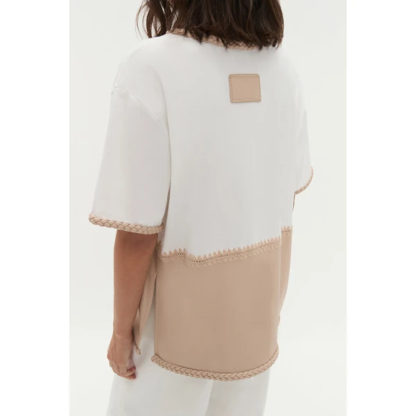 Aje Aus Tops – structured silhouette with raw femininity from Luxury Shoes 
