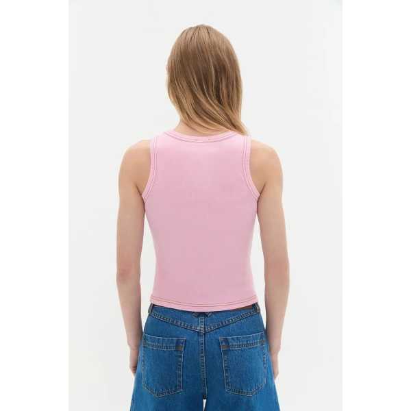 Aje Aus Tops – structured silhouette with raw femininity from Luxury Shoes 
