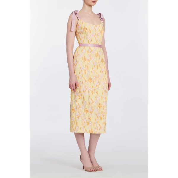 Markarian gowns with romantic neckline and structured silhouette