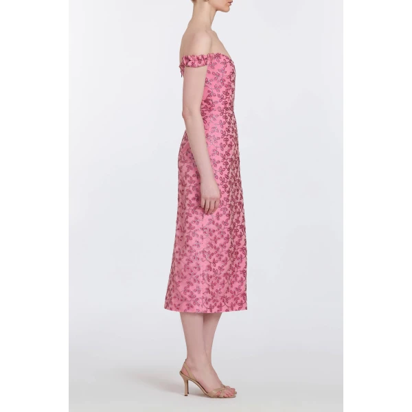 Markarian gowns with romantic neckline and structured silhouette