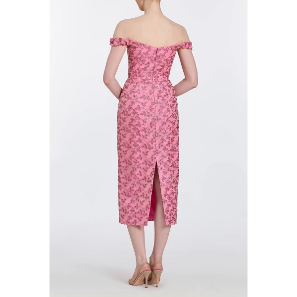 Markarian gowns with romantic neckline and structured silhouette
