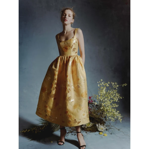 Markarian dress with romantic neckline and structured silhouette