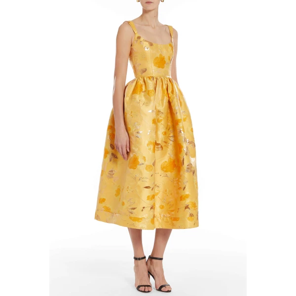Markarian dresses with romantic neckline and structured silhouette
